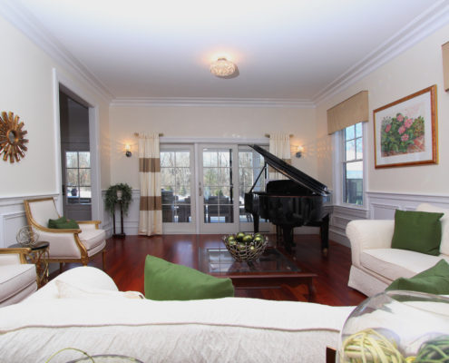 living room with grand piano custom home MA